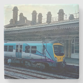 Ljusblå tåg stenunderlägg