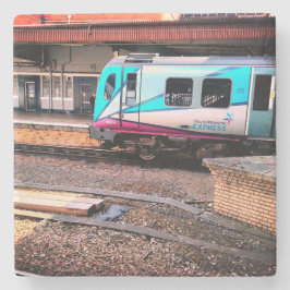 Ljusblå tåg stenunderlägg