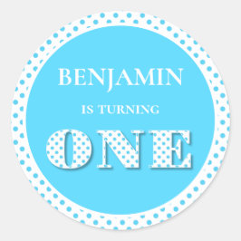 Ljusblå turering en polkpunkt runt klistermärke