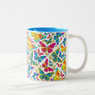 Ljusfärgat butterflies-kaffe mugg