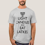 LJUSKANDLAR OCH ETTLATKAR T SHIRT<br><div class="desc">Roligt för Chanukah. LJUS CANDLES OCH EAT LATKES med en menorah. Utformning baserad på 1939 års brittiska moral.</div>