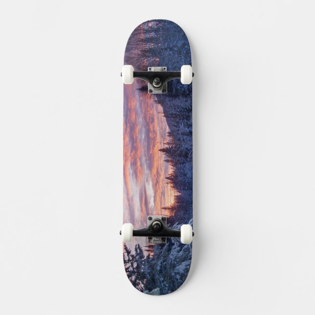 Ljusnande solnedgång målar himlen ovanför vinterla skateboard bräda 21,5 cm (Framsida)