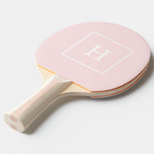 Ljusrosa vit infattad initialmonogram pingisracket