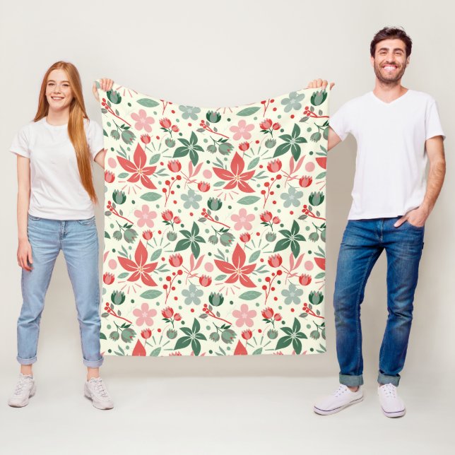 Ljust blomsterarrangemang med gröna blad och prick fleecefilt (På plats)