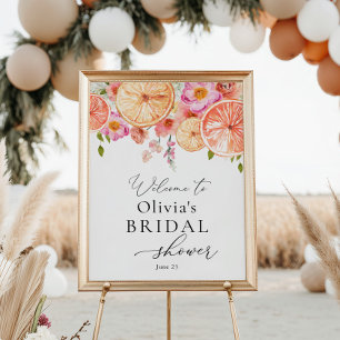 Ljust bröllopsdusch-välkomstskylt med blommor och poster