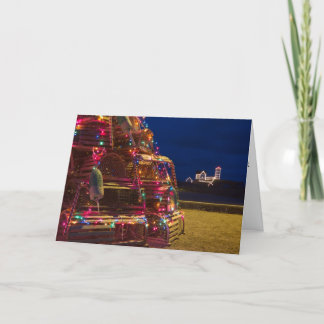 Ljust för Nubble som dekoreras på natten Helgkort