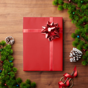 Ljust röd julpresentpapperrulle presentpapper