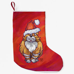 Ljust rödbrun kattjul på rött liten julstrumpa