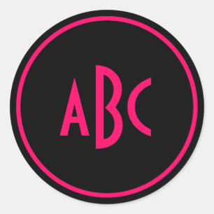 Ljust rosa och svart cirkelmonogram runt klistermärke
