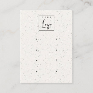 Logotyp av subtle White Ceramic Struktur 4 Earing Visitkort