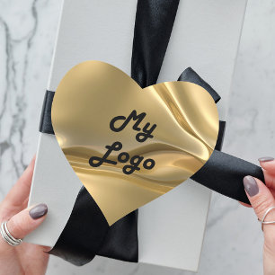 logotyp för bildföretag i guld hjärtformat klistermärke