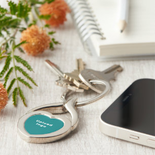 Logotyp med total Grönt bakgrunden på hjärtat Meta Twisted Heart Silverfärgad Nyckelring