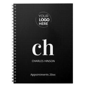 Logotyp svartvit monogram initialer anteckningsbok
