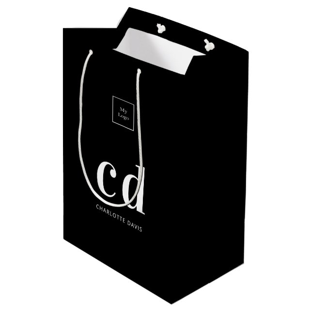 Logotyp svartvit monogram initialer shopping (Baksidan Vinklad)