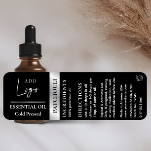 Logotypen Black Silver Essential Oil Flaska Waters Klistermärke
