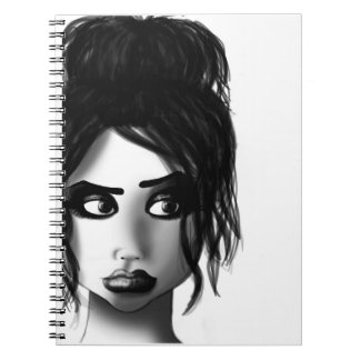 Lola noterar anteckningsbok med spiral