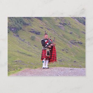 Lone Scottish bagpiper, Highlands, Scotland Vykort