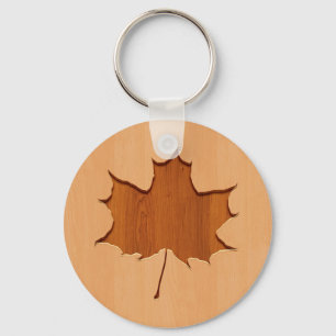 Lönnlöv som inristas på den wood designen nyckelring