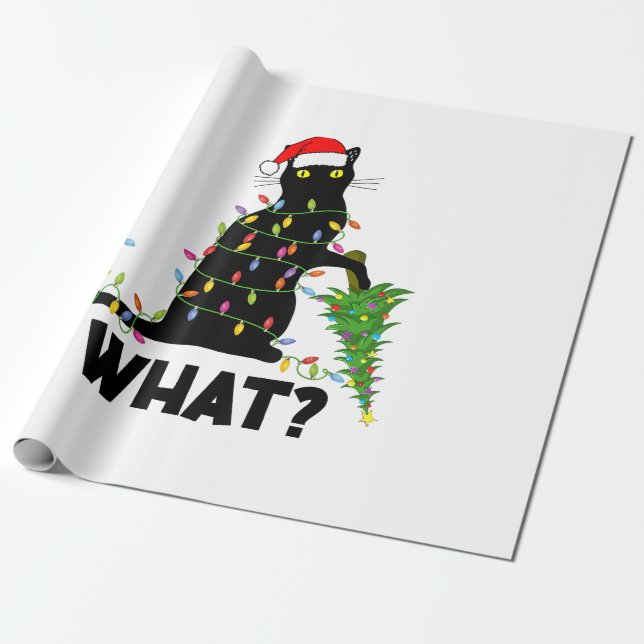 Lönsam svart katt som pressar Julgran över katt Presentpapper (Utrullad)