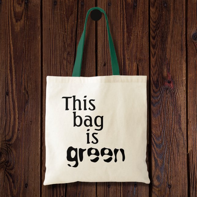 Lönsamma miljöcitat som humor kan återanvändas tygkasse (This bag is green is a fun pun for the environmentally friendly person. A sustainable way to giggle.)
