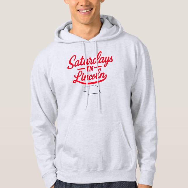 lördagar i Lincoln Nebraska | Fotboll Hoodie (Framsida)