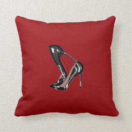 LOUBOUTIN som STAPLAS med RÖD bakgrund Kudde