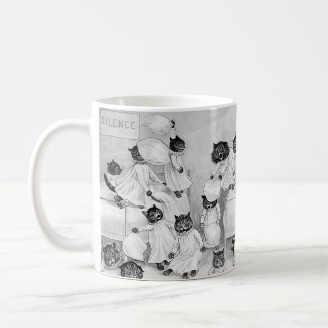 Louis Wain Cat Art Be om Bra kattkuddstrid Kaffemugg (Vänster)