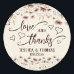 Love & Thanks Boho Wildflowers Earthtone Wedding Runt Klistermärke<br><div class="desc">These cute stickers are perfect as favor tags or envelope seals for wedding thank you cards. They feature a whimsical boho chic design with a border of wildflowers in earthtone shades of terracotta clay, dusty rose, and pewter blue on a cream colored background. there is fancy script lettering reading "love...</div>