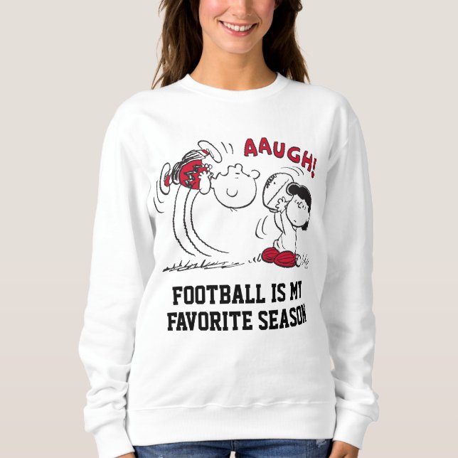 Lucy Pulls Way Football från Charlie Brown T Shirt (Framsida)
