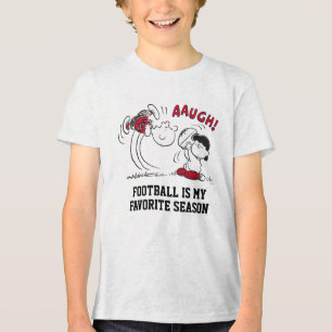 Lucy Pulls Way Football från Charlie Brown T Shirt