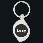 Lucy Swirl Silverfärgad Nyckelring<br><div class="desc">Schlüsselanhänger mit Namen Lucy</div>