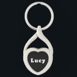 Lucy Twisted Heart Silverfärgad Nyckelring<br><div class="desc">Schlüsselanhänger mit Namen Lucy</div>