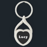 Lucy Twisted Heart Silverfärgad Nyckelring<br><div class="desc">Schlüsselanhänger mit Namen Lucy</div>