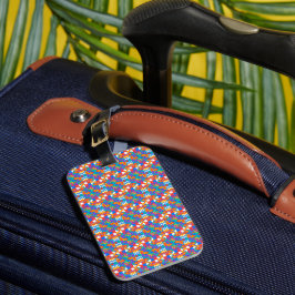 Luggage tag with a colorful geometric pattern  bagagebricka