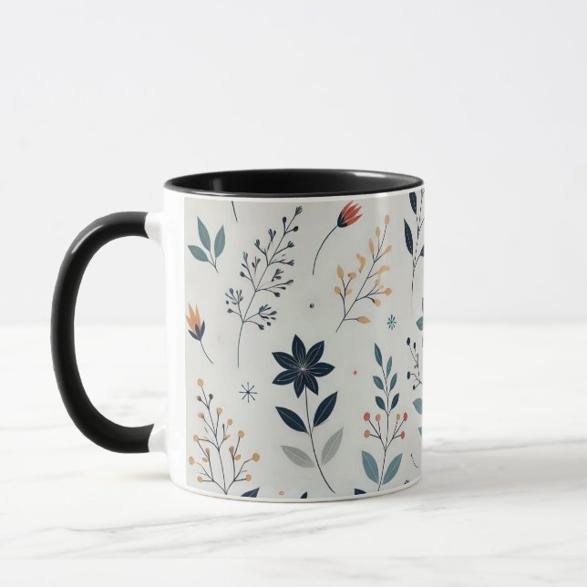 Lukka i blom: Den lövade blomsterkaffekoppen Mugg (Vänster)