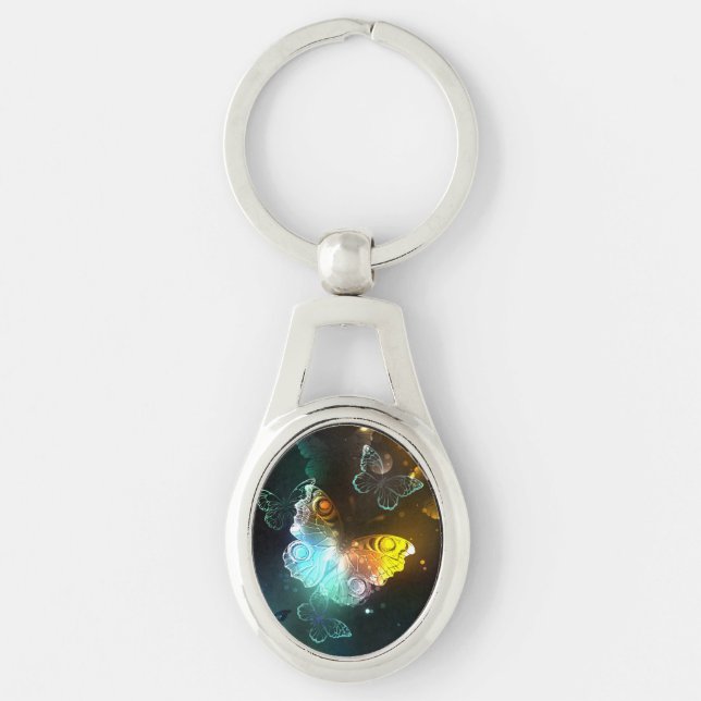 Luminösa fjäril och nattfjärilar ovalt silverfärgad nyckelring (Framsidan)