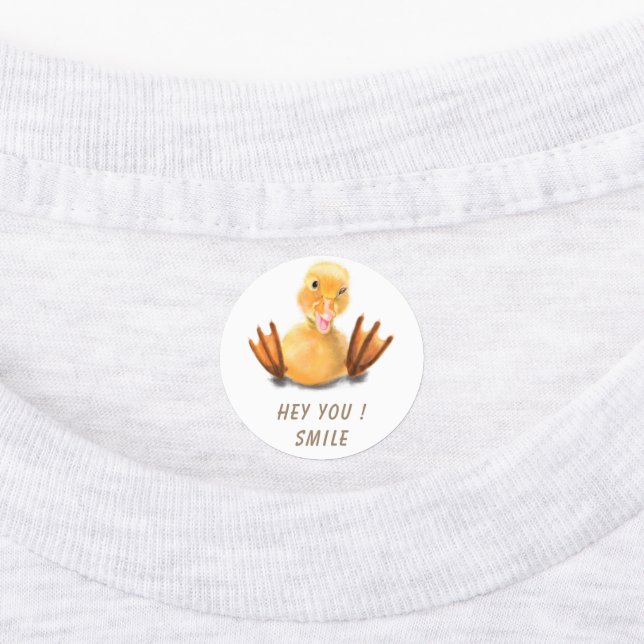 Luntiga etiketter med texten Lycklig Anka Smile -  (Påsatt)