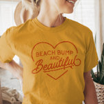Lusnyj Surfer Mamma till sommarklocka T Shirt<br><div class="desc">Höj din strand stil med vår "Beach Bumps and BeSnygg" unisex t-shirt, skräddarsydd för förväntande mammor. Fäst din strålande stöt på ett säkert och bekvämt sätt och ta med sommaren sol i stil. Designad för att fira din gravid är den här chicens garanti ett måste för att det strandnära mammorna...</div>