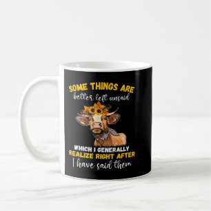 Lustig ko som säger kokviga solros kaffemugg