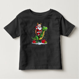 Lustiger Weihnachtsmann auf Dino mit Lichterkette T Shirt