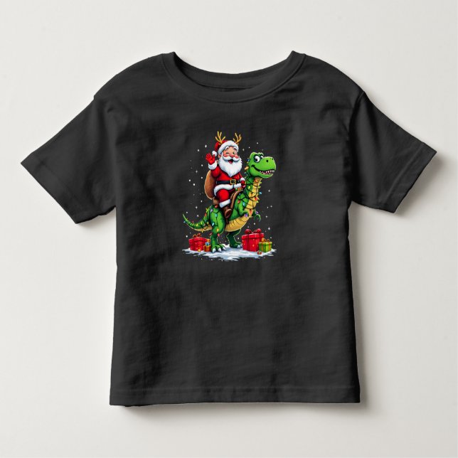 Lustiger Weihnachtsmann auf Dino mit Lichterkette T Shirt (Framsida)