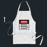 Lustigt Apron: Varning - Woman Wielding Knivar! Förkläde<br><div class="desc">Den här konstiga apron lyder: Varning! Woman Wielding Knivar! Tycker du om att laga mat? Känner du någon som gillar att tillbringa tid i köket? I så fall är den här söta plattan perfektens gåva. Lättnader och roligtar kan vara en del av , men det innebär också en viss fara,...</div>