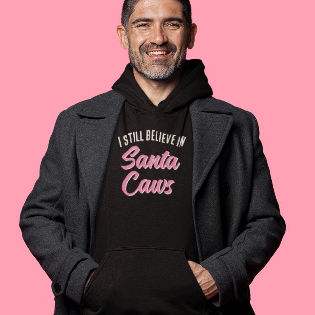 Lustigt att jag tror på jultomten. hoodie (Stay warm and stylish with this funny winter "I believe in Santa Caws" black Christmas hoodie!)