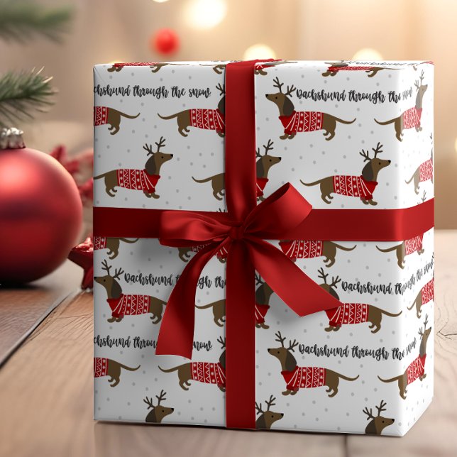 Lustigt Dachshund genom Snö-julen Presentpapper (Skapare uppladdad)