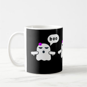 Lustigt färgat boo med ogillande flicka kaffemugg