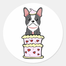 Lustigt fransk bulldog som hoppar ut ur en kaka runt klistermärke