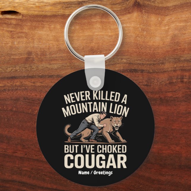 Lustigt har aldrig dödat Lejona bergsregioner, men Nyckelring (Framsida)