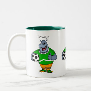Lustigt illustration av tecknaden för hippo-fotbol Två-Tonad mugg