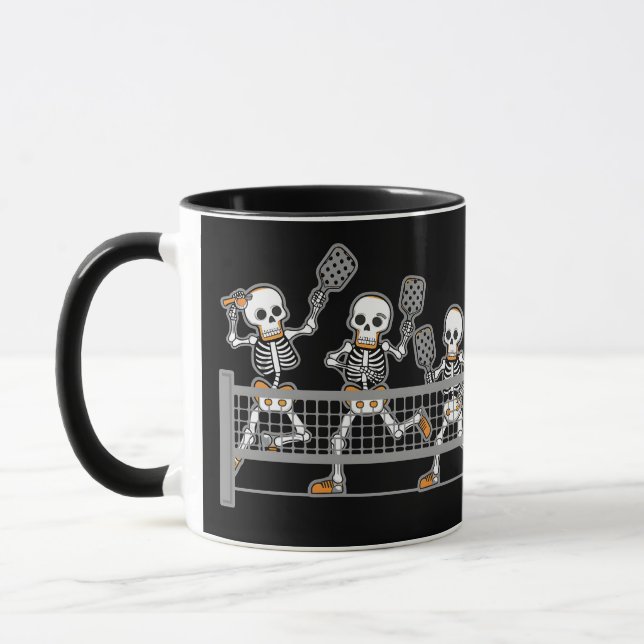 Lustigt tal tre Skeleton Playin Pickleball Gift Mugg (Vänster)