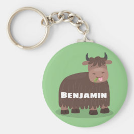 Lustigt tecknad för att äta gräs i lycklig nyckelring